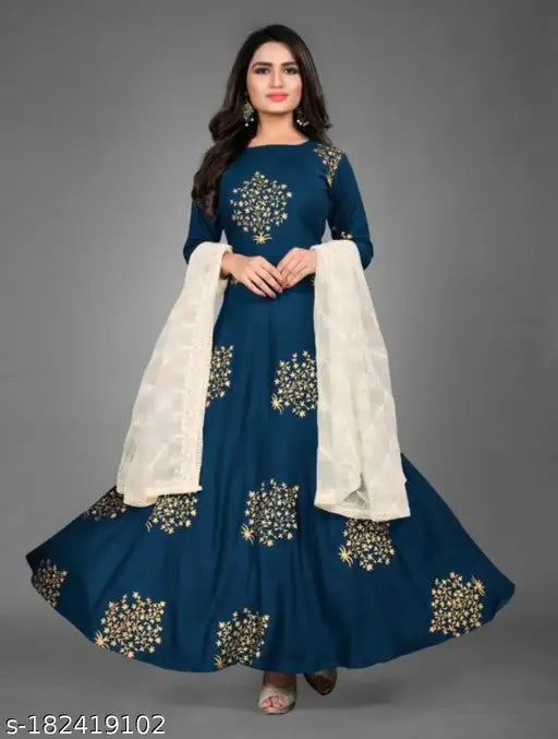 Stylish rayon gown with three-quarter sleeves, printed combo, ideal for functions, parties, and office wear. Sizes M-XXL from Saniya Industries, India