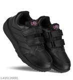 Black sneakers with velcro closures, suitable for school uniforms