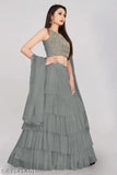 Embroidered satin lehenga set in net fabric, ruffle design, semi-stitched, free size up to 42 inch. Indian women's fashion accessory