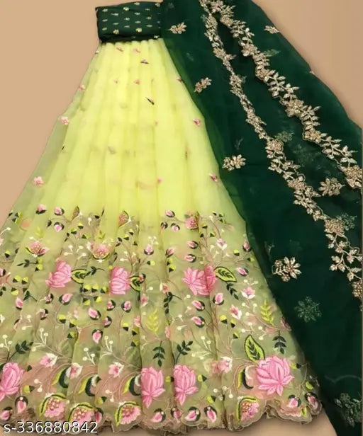 Embroidery work net lehenga choli with dupatta: Heavy Bangalore silk blouse, heavy net lehenga & dupatta featuring multi-thread embroidery, semi stitch & cut work border, and paisley pattern. Indian handcrafted traditional wedding attire
