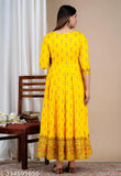 Yellow rayon hand block printed long dress-kameez with caramony embroidery, modern women's attire