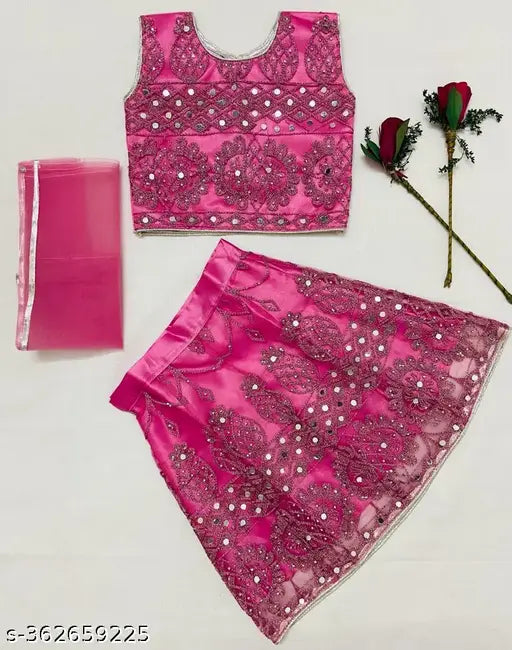 Sleeveless baby girls Lehnga Choli combo in Super Net, featuring mirror work design. Exclusive Indian-made set for weddings, school functions, birthdays, and festivals