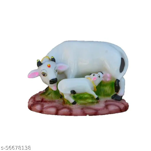 Marble look Kamdhenu cow and calf statue, poly resin Krishna idol for spiritual interior decoration or showcase display. Size: L13cm x W8cm x H9cm, weight 215gm. Made in India