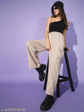 Khaki cargo pants with pockets, paired with black boots and sunglasses