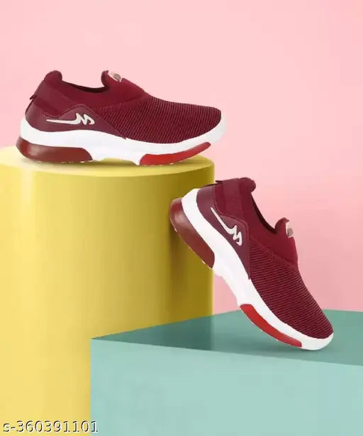 Maroon and white sneakers with black accents