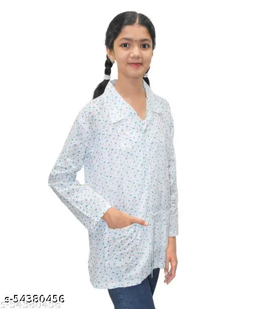 Long-sleeved cotton suncoat for kids, protects against UV rays. Solid design, skin-friendly, ideal for outdoor wear. Sizes: 2-3 Years (Bust 14in, Length 18in), available in India
