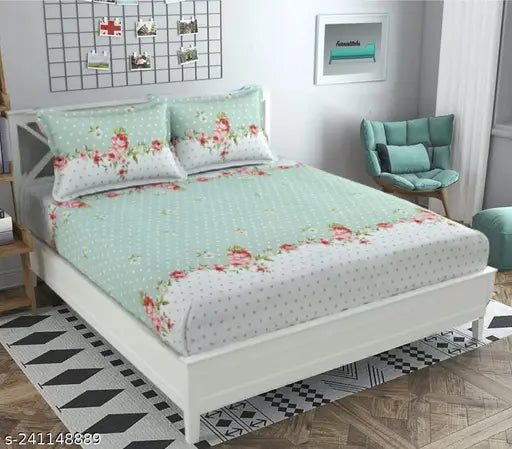 Premium polyester floral double bed sheets, king size with elastic and 2 pillow covers, perfect for summer, on a bed