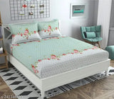 Premium polyester floral double bed sheets, king size with elastic and 2 pillow covers, perfect for summer, on a bed