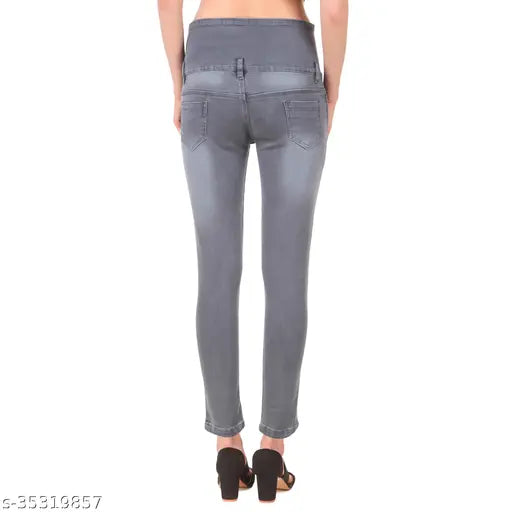 Gray stretch skinny jeans with front button closure, mid-rise