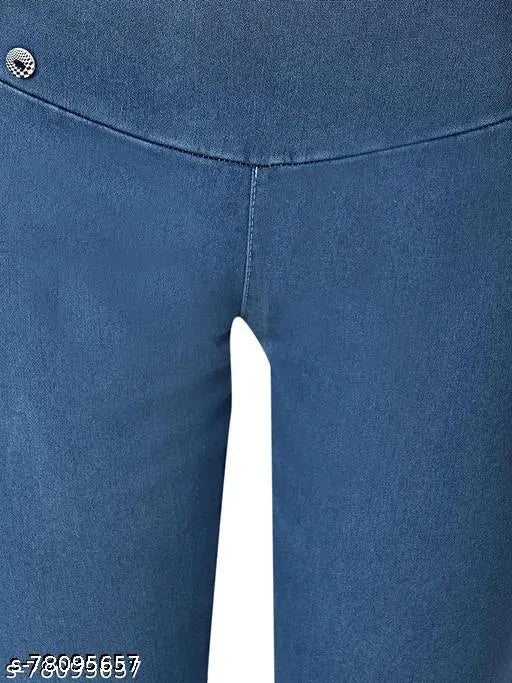 Blue denim jeggings/jeans, solid denim fabric for women's casual wear. Close-up of blue denim jeans on hanger with size 32 waist and length 37 inches, made in India