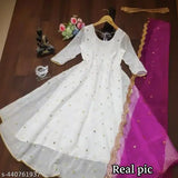 White Georgette embroidered blouse set with matching dupatta, heavy embellished Indian bridal wear on mannequin