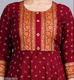 Burgundy rayon womens kameez with floral print, long sleeves, button detail at chest