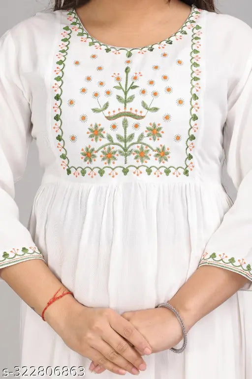 White rayon embroidery malti, intricate Indian fashion with three-quarter sleeves, showcasing traditional embellishments