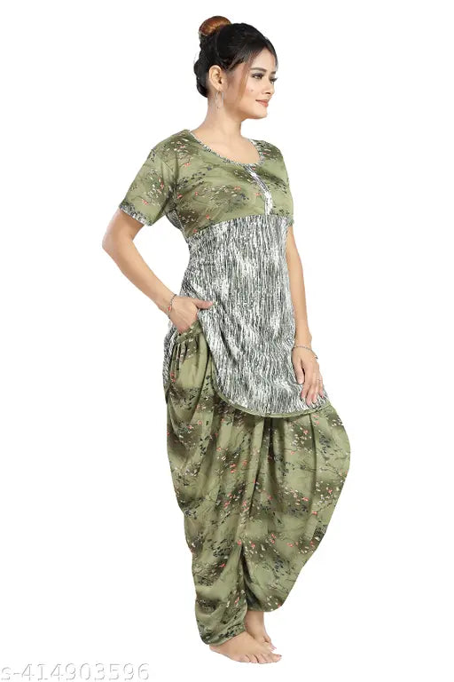 Green polyester dhoti top night suit with printed net pattern, featuring round neck and short sleeves