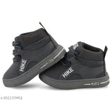 Black kids' shoes with white logos
