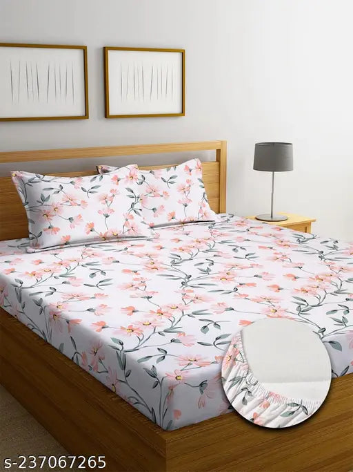 Soft white premium cotton floral print king size fitted bedsheet set, featuring 2 pillow covers and all-around elastic. Made for luxurious summer comfort