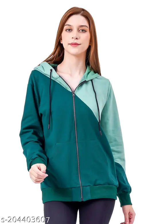 Green cotton blend color-blocked hooded sweatshirt by Nuevosdamas, perfect for casual wear with black jeans and sneakers