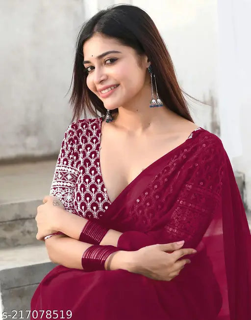 Vivid maroon women's saree with sequin embroidery and georgette fabric, dyed border