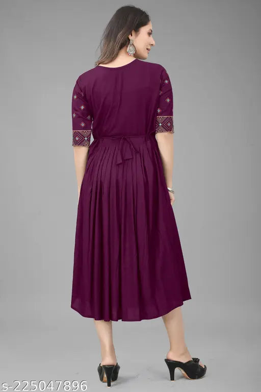Purple Rayon embroidered kurti with three-quarter sleeves. Traditional Indian clothing for festivals, parties, or weddings