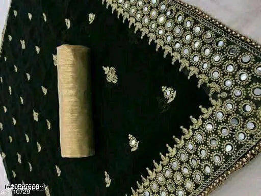 Black and gold saree with a mirror pattern design
