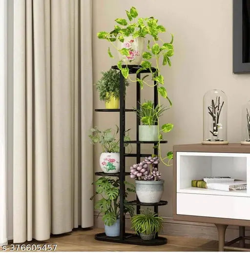 Black metal tiered plant stand with six tiers, each holding a potted green plant, suitable for indoor or outdoor use