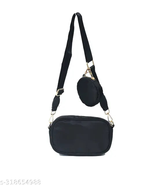 Black leather crossbody sling bag with a small detachable pouch