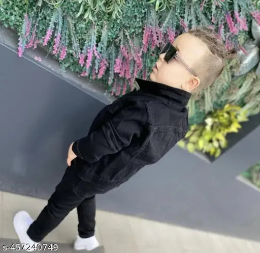 Boy wearing a black leather jacket