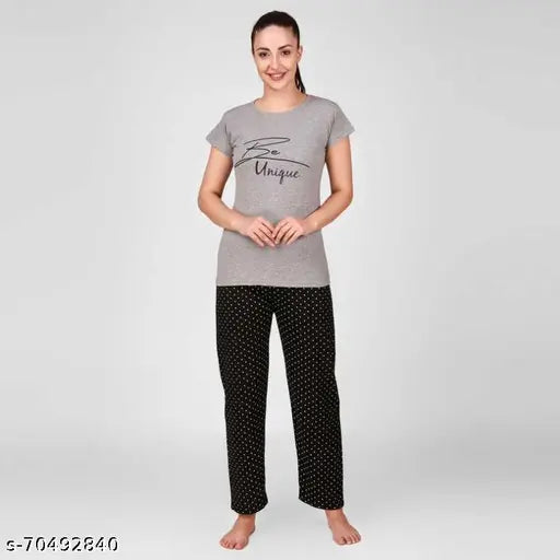 Trendy hot pink 100% cotton women's night suit set with black floral-patterned pyjamas, India origin