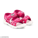 Pink slipper with velcro straps, featuring a toy car design on the footbed