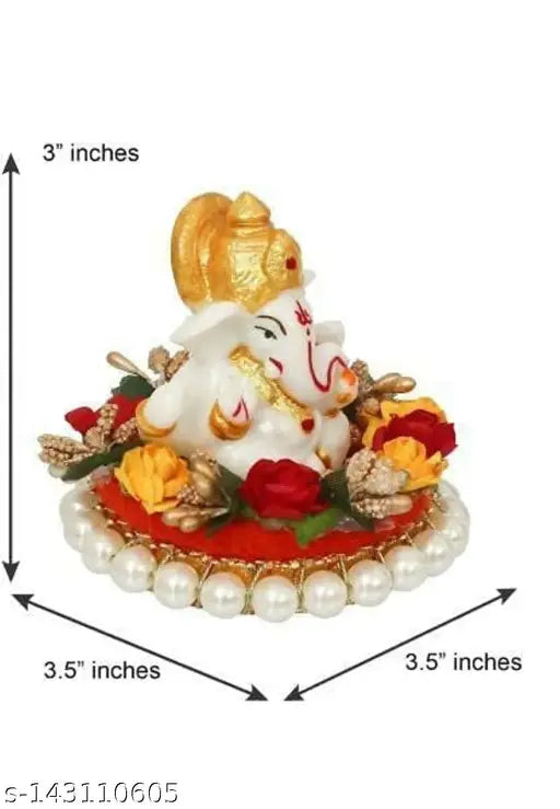 Multicolor polyresin Ganesh Idol sitting on gungroo bangles, decorated by flowers. Hand-painted for a vibrant decorative showpiece (9 cm)