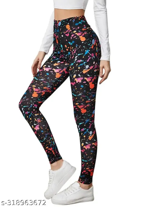 Black printed net lycra tights for women's activewear, suitable for yoga, gym, or sports. Available sizes: 26, 28, 30, 32, 34, 36 (waist 26-36 in, hip 30-40 in, length 39 in). Made in India
