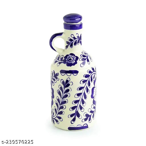 Beige ceramic oil dispenser, 1 liter capacity for kitchen storage, ideal for oil or liquor. Unique, spill-proof design
