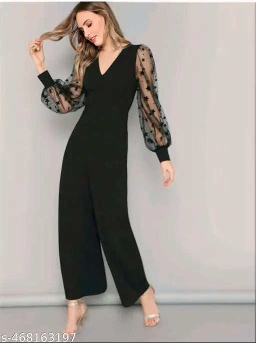 Elegant black Lycra V-neck jumpsuit with sheer star-print sleeves - ideal for parties, available in sizes M, L, XL, XXL (India)