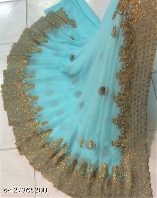 Embroidered georgette saree with blue unstitched blouse, intricate detailing