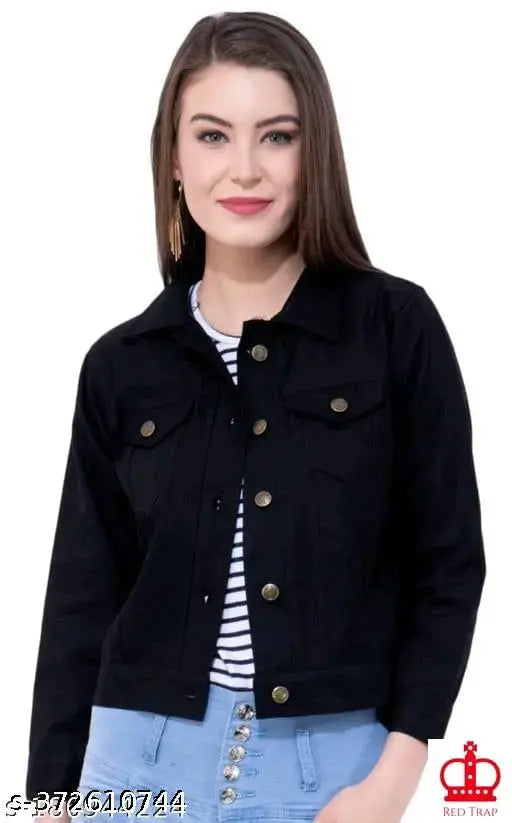 Black denim jacket with white sleeves, fitted style, blue jeans underneath, zip closure
