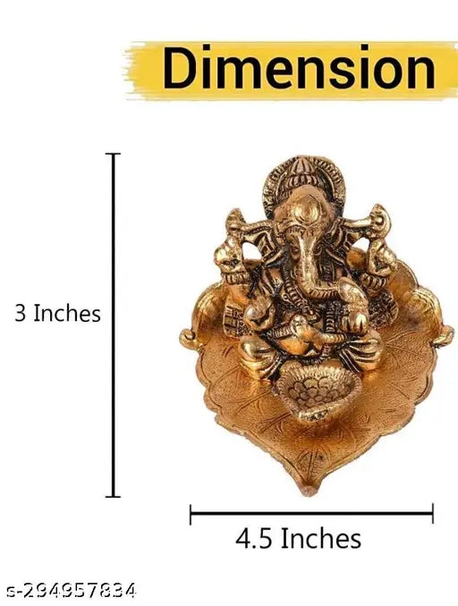 Metal Lord Ganesha sitting on leaf with diya, handcrafted for home decorative gift or Puja, 9cm x 5cm x 12cm, India origin
