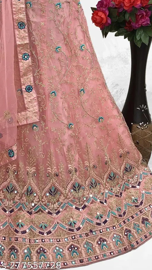 Pink net embroidered Lehenga Choli Set with dupatta, ideal for parties or festivals