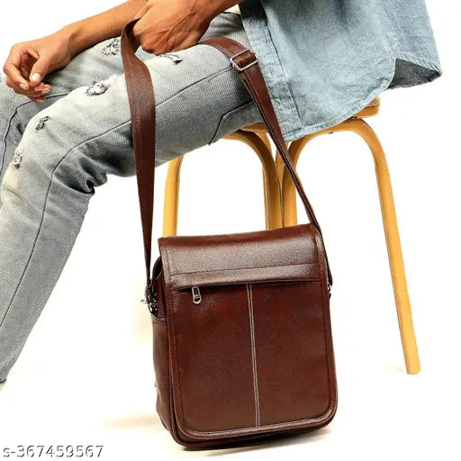 Men's brown synthetic leather crossbody bag with multiple pockets, adjustable strap and zip closure. Ideal for travel, work or fashion accessory