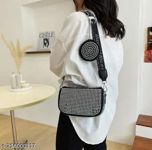 Classic black and white dotted women's sling bag with shoulder strap
