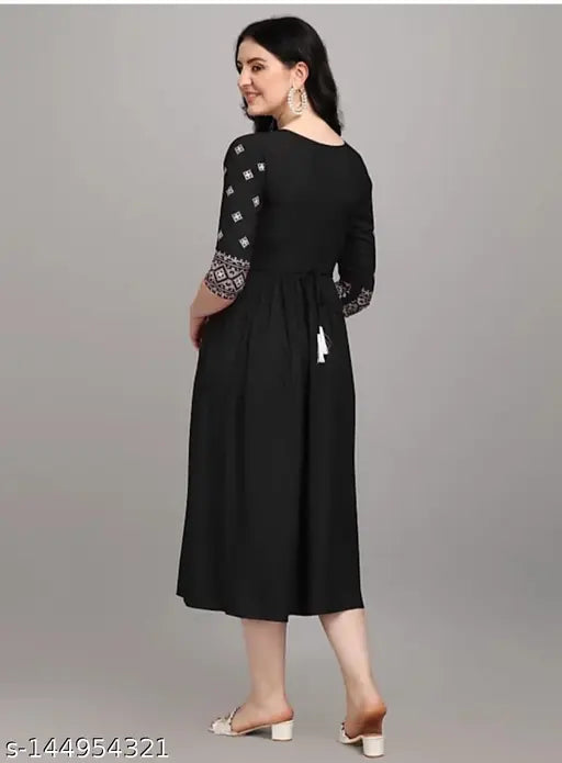 Black rayon embroidered flared kurti, three-quarter sleeves, intricate embroidery, statement party wear outfit, Indian designer fashion