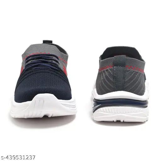 Blue sneaker with white sole, black laces, and red accent stripes on side