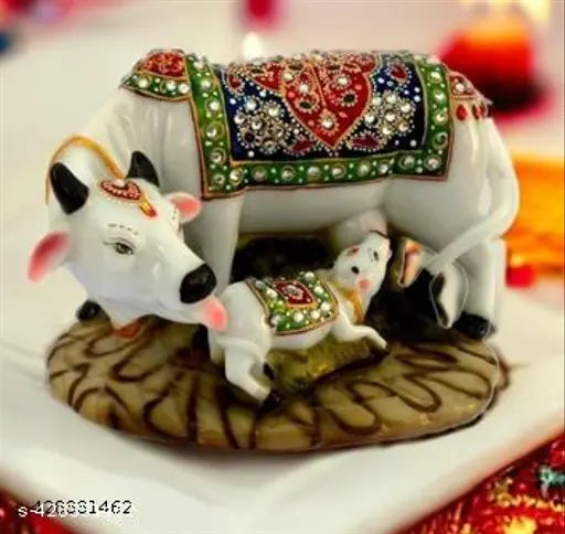 High-quality marble Kamdhenu cow and calf statue with diamond embellishments, spiritual Vastu idol for home decor