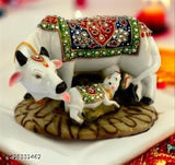 High-quality marble Kamdhenu cow and calf statue with diamond embellishments, spiritual Vastu idol for home decor