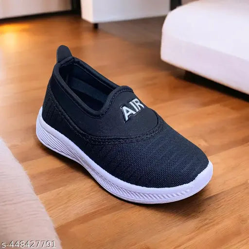 Stylish & affordable black sneakers for boys, mesh material with lace-up fastening. Ideal for casual and formal outfits