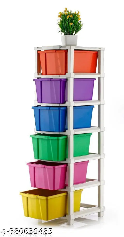 A stack of six drawers with a variety of vibrant colored bins inside, including yellow, blue, pink, and red. The storage organizer system appears to be made of metal or plastic