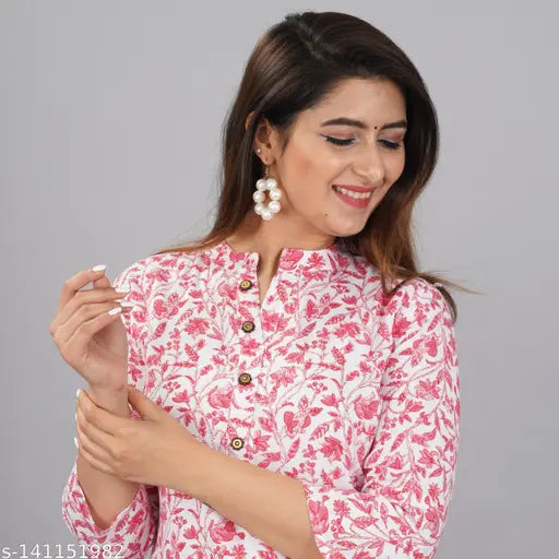 Rayon coral pink contrast print kurti-plazzo set for women's fashion, three-quarter sleeves with net pattern on display