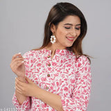 Rayon coral pink contrast print kurti-plazzo set for women's fashion, three-quarter sleeves with net pattern on display