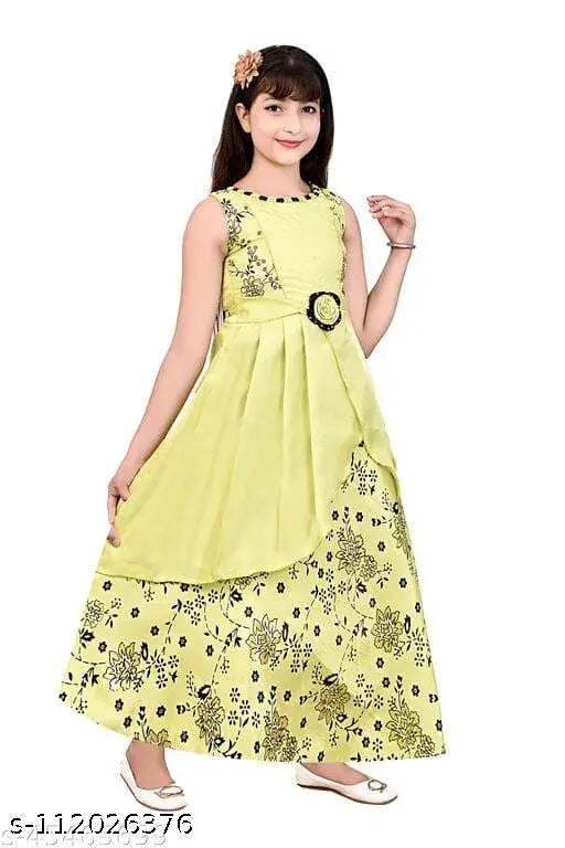 Silk blend sleeveless printed net dress for cute girls aged 3-14 years, designed by Almiraj Garments from India