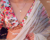 Embroidered georget sari with matching blouse, floral pattern, sleeveless, Indian wear, women's formal attire, traditional sari