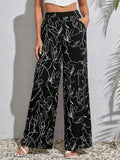 Black women's high-waisted bell bottom trousers with a drawstring waistband